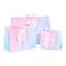 Custom Logo Holographic Gift Paper Clothing Bags ISO Gradient Drawstring Paper Bag