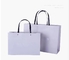 ODM 180gsm To 250gsm Present Paper Bags Clothing Wedding Favor Bags With Handles